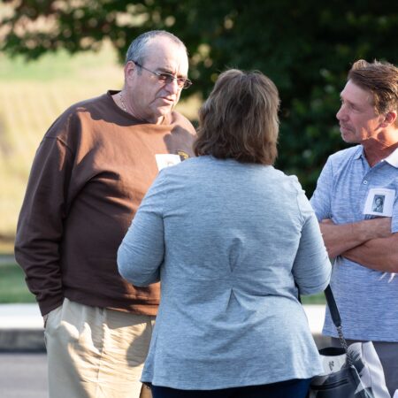 a group of people standing outside