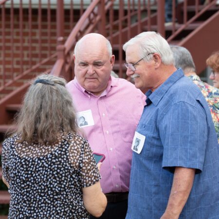 a group of people standing outside