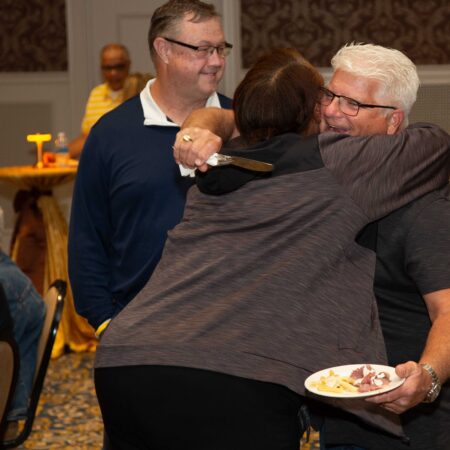 a group of people hugging