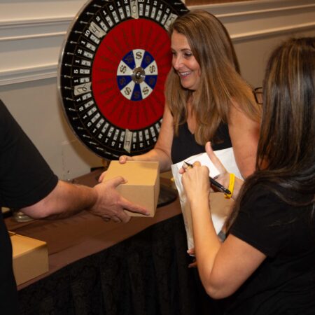 a person receiving a package from a person