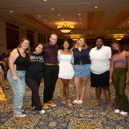 a group of people posing for a photo