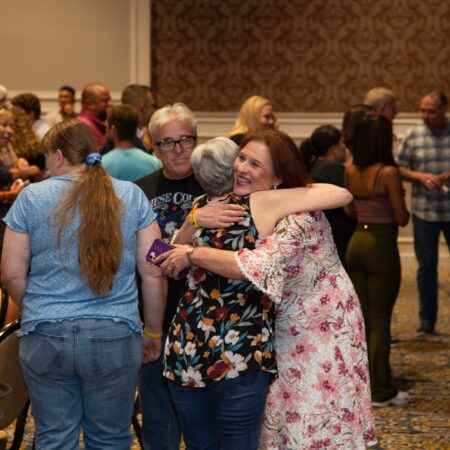 a group of people hugging